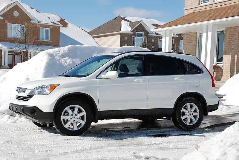 Hot on the Ford's heels in sales volume, Honda's CR-V is a ubiquitous sight in the school parking lot. Figure a 2008 or 2009 model will be within budget, and then it's down to trim levels.