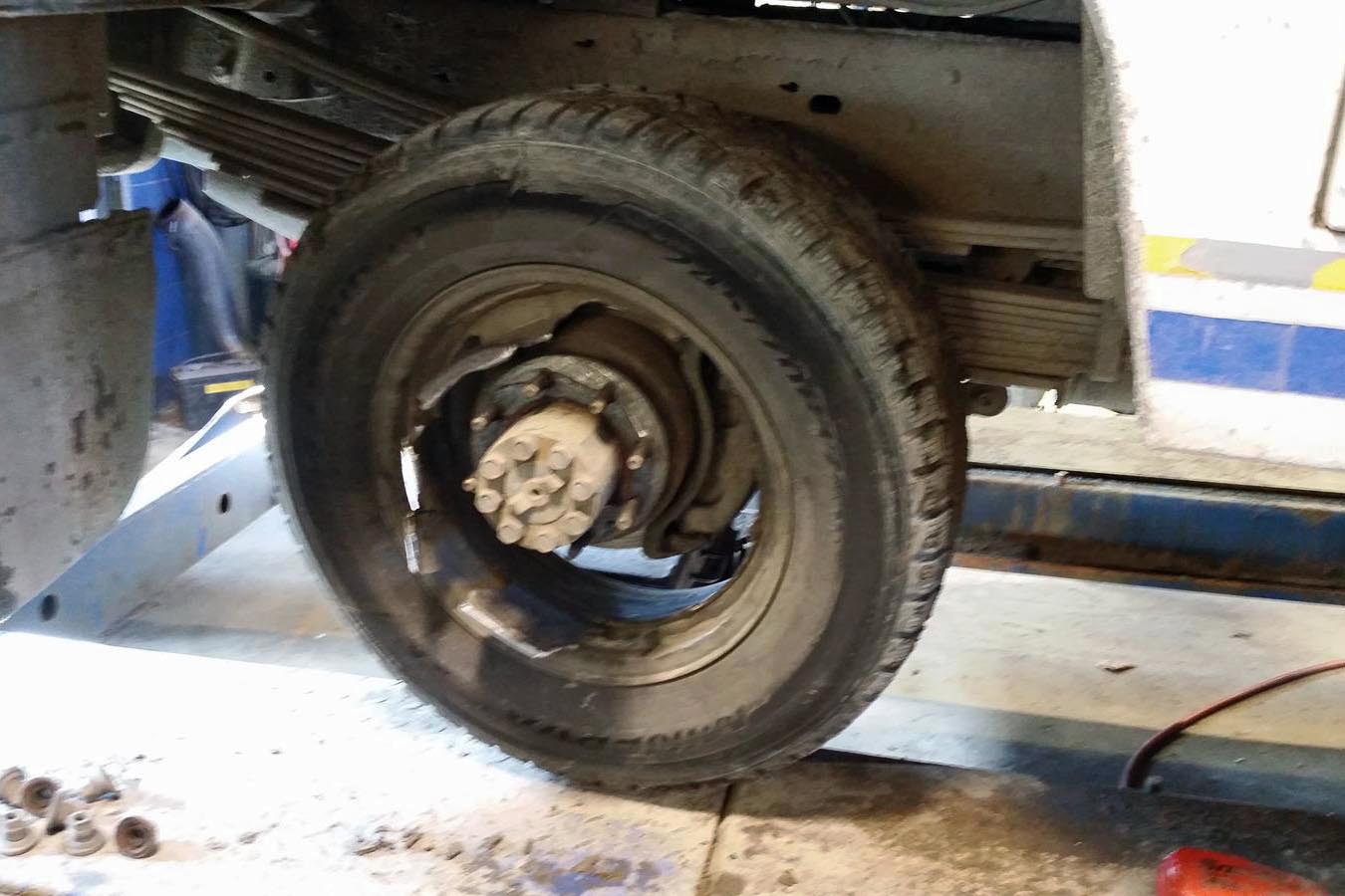 broken rear wheel assembly