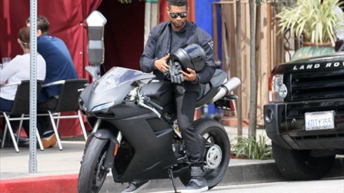 In his 20-year career, Usher has earned well into the nine figures recording his own hit records as well as mentoring the likes of Justin Bieber. As with many people who have so much money they literally cannot spend it all, he has a large collection of vehicles (despite, you know, only being able to drive one at a time). Included in this collection are at least three motorbikes: a Ducati 848 Evo Superbike, a Ducati Monster 1100 Evo, and a custom-built number he's named the Brawler GTC.