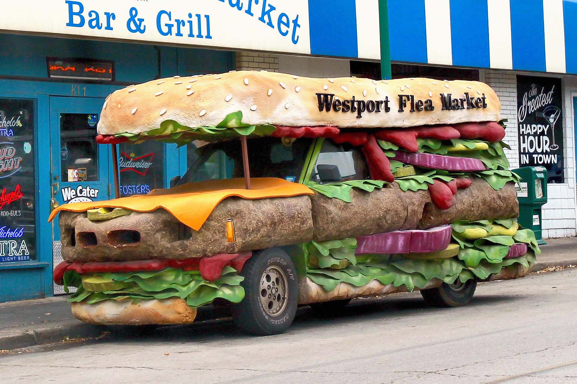 While not a food truck per se, this promotional bus for Westport Flea Market Bar and Grill is delicious. Created by master promotional vehicle artist Matt Targon, who had always dreamed of creating a burger car, the beefy, cheesy vehicle based on a Chevrolet S10 pickup roams the streets of Kansas City getting the name of this tasty burger joints out and about.