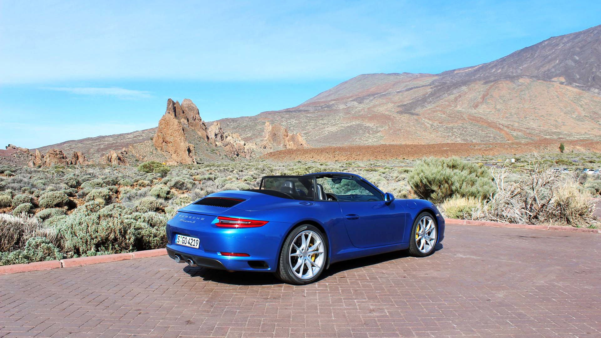 The 2017 Porsche 911 Carrera Cabriolet starts at $116,200. This is a Carrera S Cabriolet – base price $132,200. That volcano last erupted in 1798. If it happens again, the 911’s roof goes up in less than 20 seconds.