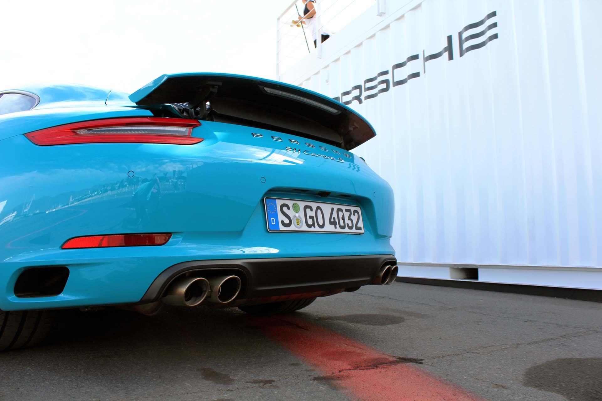 The 911’s rear spoiler deploys at 120 km/h but will rise earlier if engine needs more cooling. This Carrera S has the standard exhaust system – the pair of wide spread dual-tips are the clue.