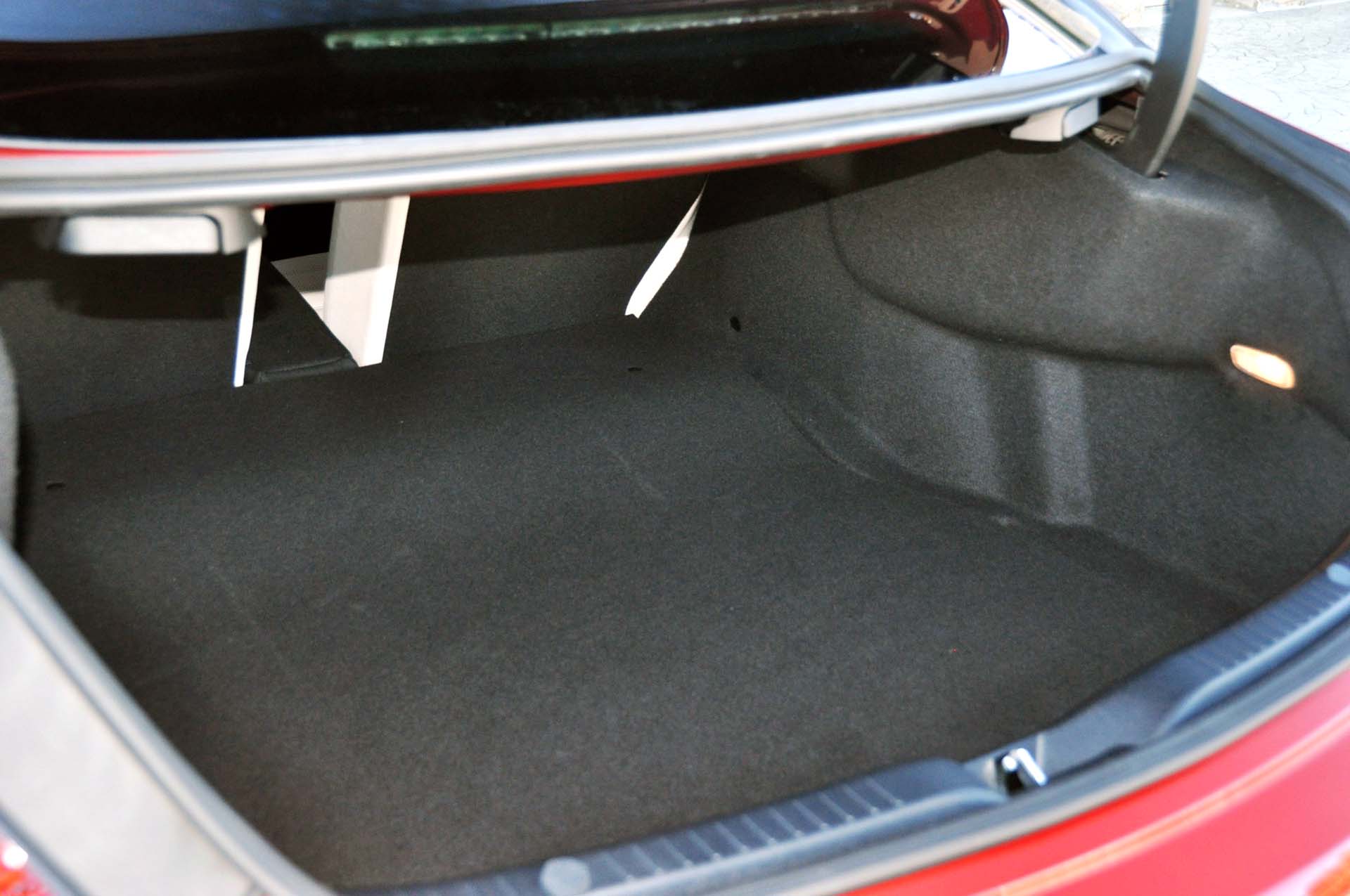 Surprisingly, there's a large, useful trunk. The rear seats are split-folding, so this is actually a car that you can travel in. Lots of room for luggage, in other words.