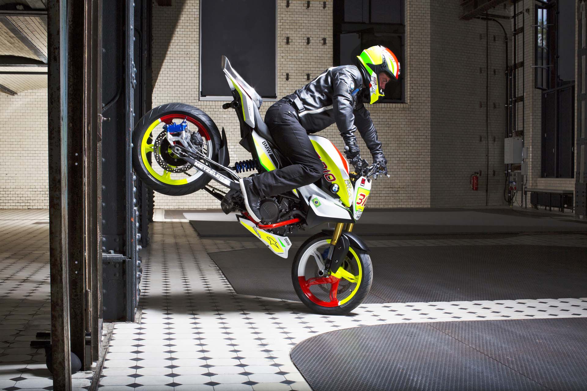 There are more than a few people who’ve been waiting for BMW to join the small-bike class. The G 310 R is their answer. The 313 cc single is good for 34 hp at 9,500 rpm and 21 lb-ft of torque at 7,500 all pushing a 159 kg (dry) chassis. It has ABS and inverted forks, so it looks the goods. Like ‘em weird? This one has its intake in the front and exhaust out the back of the cylinder head. The bike pictured is a stunt concept produced to promote the 310.