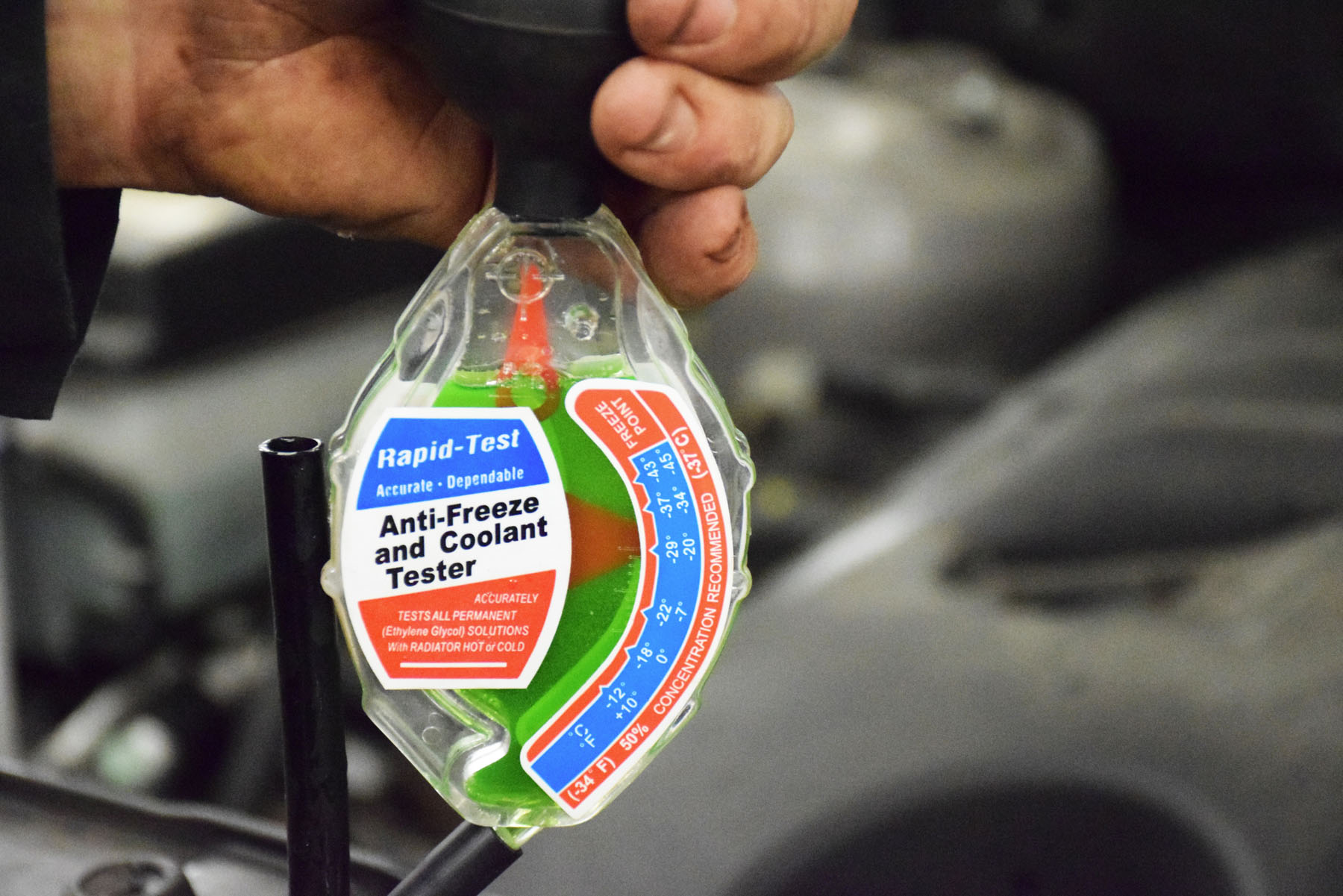 <b>Cooling System:</b> Your mechanic can also check how healthy your engine coolant is with a special tool, shown here.