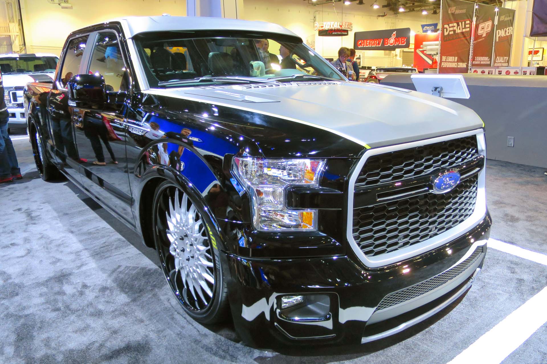 Ford's F-150 SuperCrew is modified by Bojix Design with larger turbochargers on the EcoBoost engine, Full Race intake system, seven-inch lift kit, and Brembo brakes.