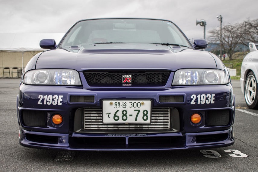 The R32 was built until 1994, and the car that replaced it was not quite as fierce at first. The R33 GT-R was a smoothing of the breed, slightly heavier, a little better equipped, and easier to drive.