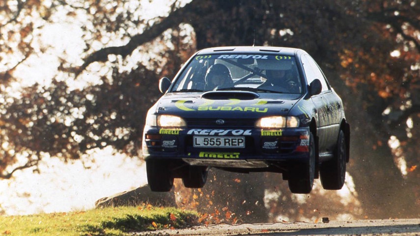 As far as fans of the STI are concerned, the story begins with Colin McRae, air-borne over a hump in the road and streaming gravel out behind him like a comet. The triple-5 car would be both hero car and forbidden fruit to Canadian rally fans. Prepared by racing specialists Prodrive, this 300 hp Group A rally car thrilled audiences. Scottish driver McRae was perhaps less precise than his Finnish rivals, but his seat-of-the-pants style earned him a huge fanbase.