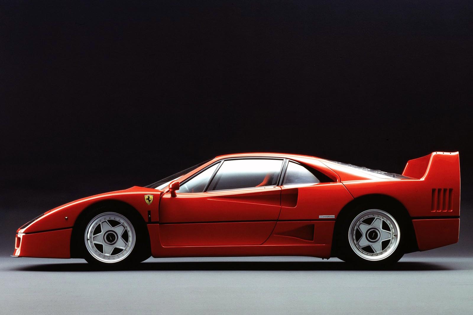 Dear Ferrari: thanks for being Italian, being pretty sweet, and making cars we listen to on YouTube when the boss is distracted by the Keurig for a latte refill. Thanks, also, for the F40. We love its little boosted V8, how the exhaust sounds like a Velociraptor’s mating call, and the mental image of ripping through its gears like Christmas-morning wrapping paper. Still said to be the world’s best supercar, we’re glad this machine helped set the stage for the great supercars that we lust after today.