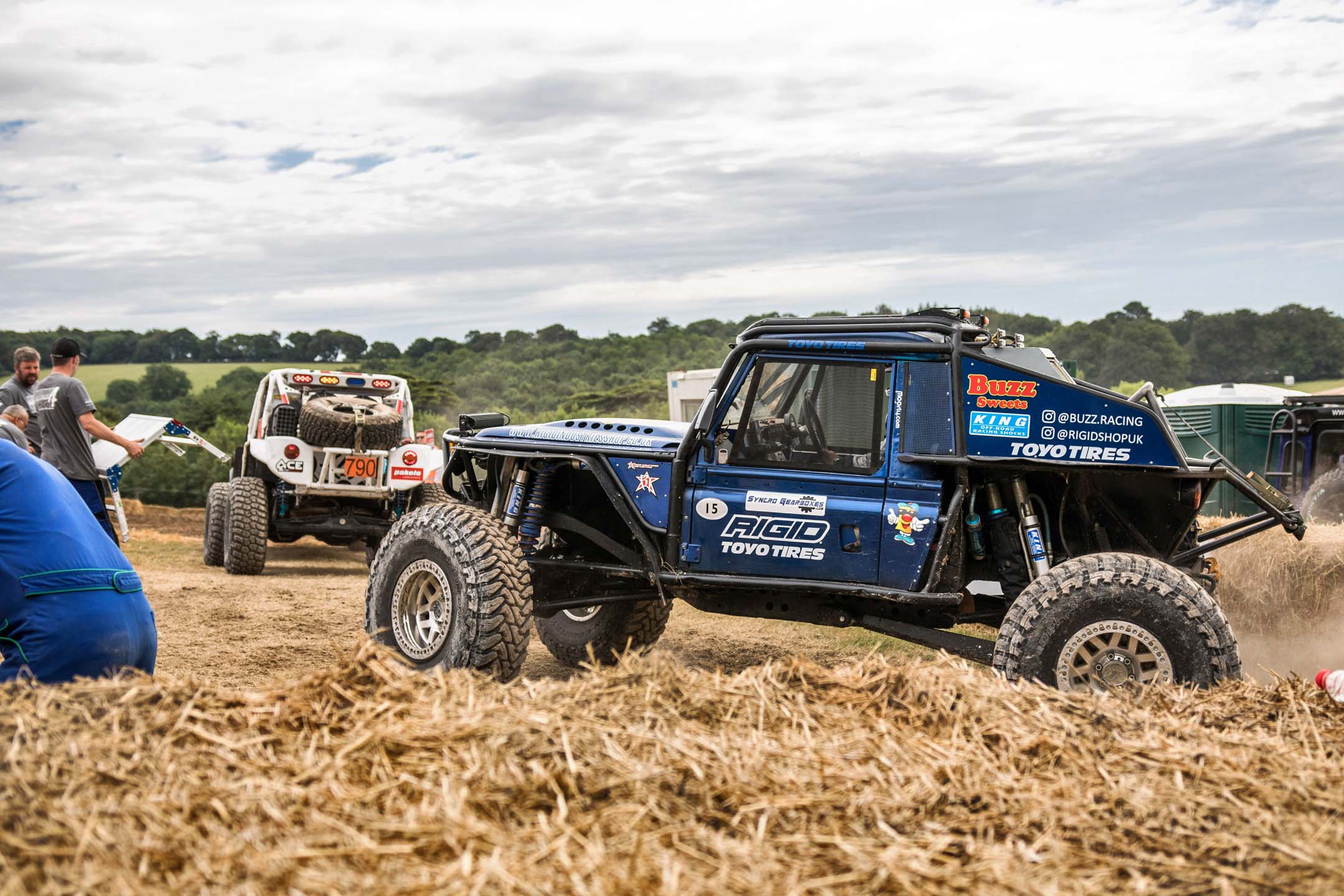 As Goodwood has expanded, the course has grown from just the tarmac climb to off-road and rally sections. Here, heavily modified machines make ready to head out onto the ruts and jumps of the off-road course.